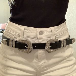 Double Buckle black belt with silver details.